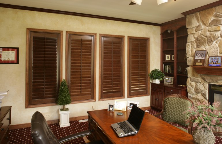Hardwood plantation shutters in a Southern California home office